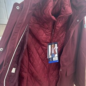 Brand new coat beautiful warm in rain with vest inside